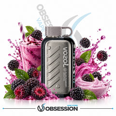 Vozol Vaporesso 1000 disposable vape device in a metallic silver and black finish, surrounded by a stylized fruit and berry splash theme with blackberries, raspberries, mint leaves, and a pink smoothie on a white background. The Obsession Vapo Store logo is visible at the bottom.