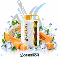 A white VOOZ vape device with a gold mouthpiece and side panel, surrounded by melon slices, ice cubes, and mint leaves on a white background with Obsession branding.