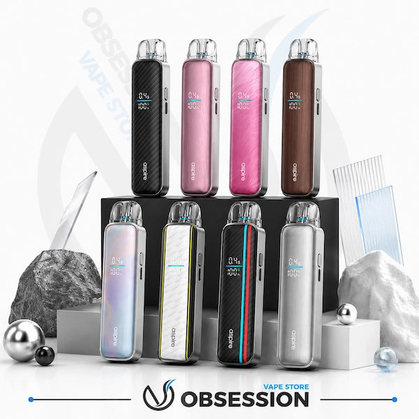 Eight Obsession vape devices in various colors and finishes, arranged in two rows on black display blocks with decorative rocks and spheres.