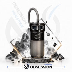 A metallic cylindrical vape device with a curved hose, standing on a stone-like base with dramatic rock props and smoke effects. The Obsession Vape Store logo is visible at the bottom, with a faint Obsession Vape Store watermark in the background.