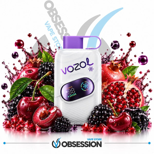 A white Vozol vape device with a purple mouthpiece and digital screen, surrounded by fresh fruit splashes including cherries, blackberries, pomegranate, and green leaves on a white background with Obsession and Vapo Store branding.