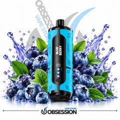 A blue and black Obsession vape device labeled 'BLUE BERRY' stands in front of a stylized arrangement of blueberries, mint leaves, water splashes, and a white background with Obsession branding.