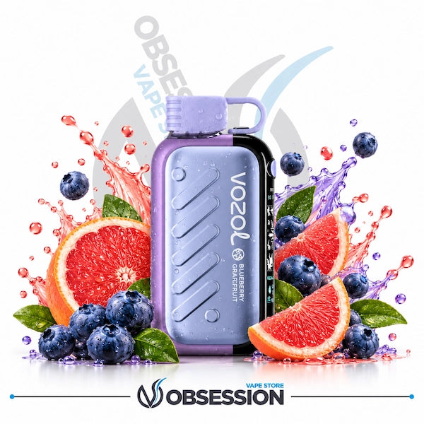 A Vozol Grapefruit disposable vape device in lavender purple and black, surrounded by fresh grapefruit slices, blueberries, and purple liquid splashes on a white background with Obsession branding.