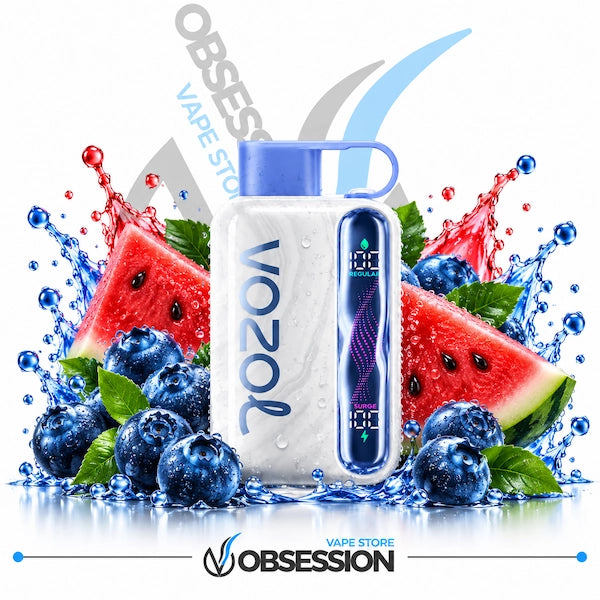 A white VOZOL vape device with a blue mouthpiece and a digital display screen, surrounded by watermelon slices, blueberries, mint leaves, and water splashes on a white background with Obsession Vape Store branding.