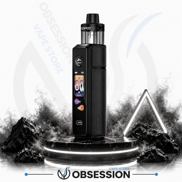 A black Obsession Xapo 30W vape device with a digital display screen, standing on a glowing circular platform with dark rocks and smoke effects in the background.