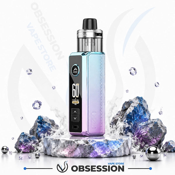 A Obsession vape device with a blue-to-purple gradient finish, standing on a decorative crystal base with digital display showing 60W. The background is white with watermarks and decorative crystals.