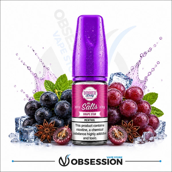 Grape Star Menthol Salt 30ml By Dinner Lady.webp shows a Dinner Lady Grape Star Salts vape juice bottle with a vibrant, droplet-covered purple cap. The bottle sits centrally in a premium, high-contrast arrangement of flavor and cooling elements