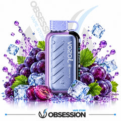 A Vozol disposable vape device in metallic lavender and black, surrounded by purple grapes, green leaves, ice cubes, and purple liquid splashes on a white background, with Obsession branding at the bottom.