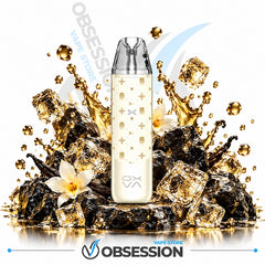 A disposable vape device with a cream-colored body and gold patterns, surrounded by gold liquid splashes, ice cubes, and a white flower on a white background with Obsession branding.