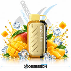 A gold and black Vozol vape device with a mango ice flavor theme, surrounded by graphic elements of sliced mango, ice cubes, and liquid splashes on a white background with Obsession and VapoStone branding.