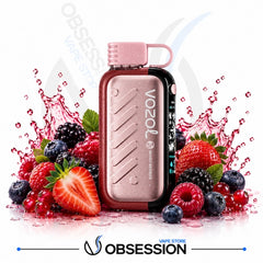 A Vozol vape device in a metallic rose gold finish with a black side panel, surrounded by fresh berries and strawberries with a pink liquid splash on a white background. The brand 'Obsession' is visible at the bottom.