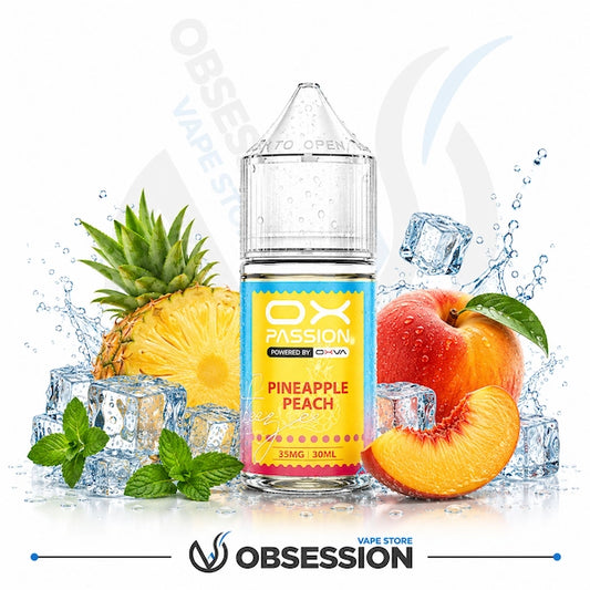 A bottle of OX Passion e-liquid in Pineapple Peach flavor, styled with fresh pineapple, a peach, a peach slice, mint leaves, and ice cubes on a white background with water splashes.