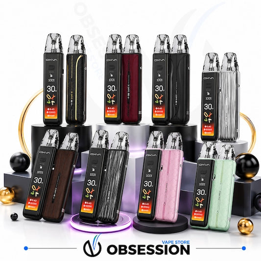 A group of disposable vape devices from the brand OBSESSION, shown in multiple colors including black, dark brown, burgundy, silver, pink, and mint green, arranged on display stands with decorative black and gold spheres.
