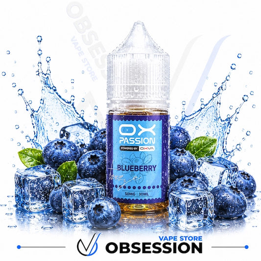 Bottle of Ox Passion Blueberry vape juice surrounded by blueberries and ice cubes on a white background.