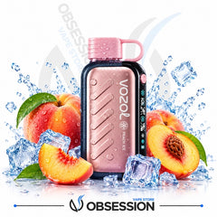 A Vozol Peach Ice disposable vape device in metallic rose gold with a pink mouthpiece, surrounded by fresh peaches, peach slices, and ice cubes on a white background with water splashes. The Obsession Vape Store logo is visible at the bottom.
