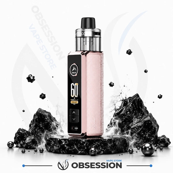 A pink and black vape device with a digital display screen, standing on a black marble base surrounded by decorative black rocks and floating metallic spheres on a white background. The brand name 'Obsession' is visible at the bottom.
