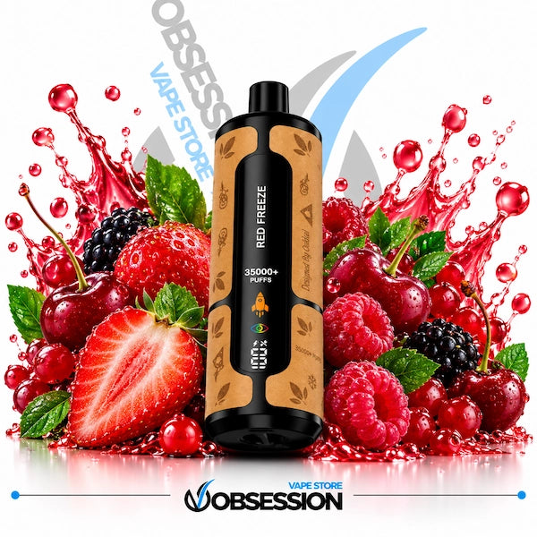 A black disposable vape device with tan patterned side panels stands centered in front of a white background, surrounded by fresh red strawberries, raspberries, cherries, blackberries, and green leaves with red juice splashes. The vape label reads 'RED FREEZE' and '35000 Puffs'.