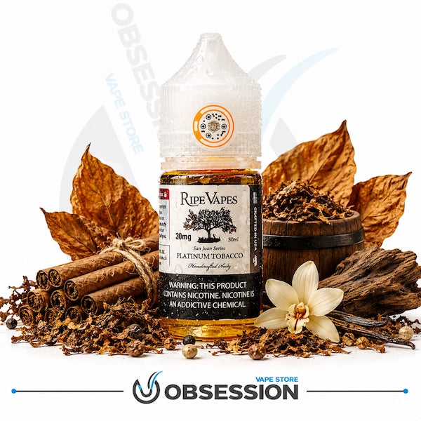 A bottle of Ripe Vapes Platinum Tobacco e-liquid centered on a white background, surrounded by cinnamon sticks, dried tobacco leaves, a small wooden bowl of tobacco pieces, and a white flower. A large 'OBSESSION VAPE STORE' watermark and logo appear on the image.