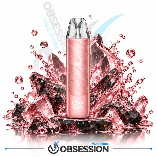 A pink disposable vape device stands upright in front of a stylized cluster of dark crystals and pink liquid splashes on a white background, with Obsession branding visible.