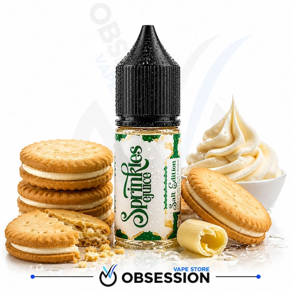 A bottle of Obsession Sprinkles Glucose e-liquid Salt Edition flavor, styled with cream-filled sandwich cookies, a swirl of whipped cream, and crumbs on a white background with a brand watermark.