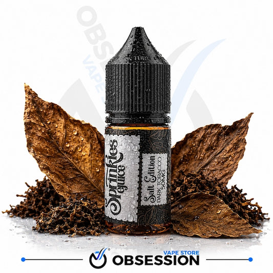 A bottle of Swinkles Glue Salt Edition Tobacco CO vape liquid, styled with dried tobacco leaves and tobacco stems on a white background with a 'Obsession Vape Store' watermark.