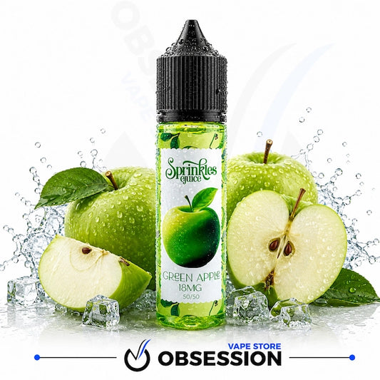 A bottle of Sprinklez Juice Green Apple 18MG e-liquid centered on a white background, surrounded by fresh green apples, sliced apples, ice cubes, and water splashes. The bottle has a black cap and a green-and-white label showing a green apple graphic.