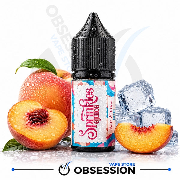 A bottle of Obsession Sprinkles Juice e-liquid, flavor Peach Ice, centered on a white background with fresh peach halves, a whole peach, green leaves, and ice cubes arranged around it.