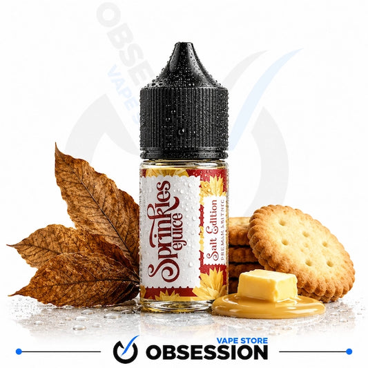 A bottle of Obsession Salt Gumin 'Sprinkles' e-liquid, styled with autumn leaves, cookies, and butter on a white background with a brand watermark.