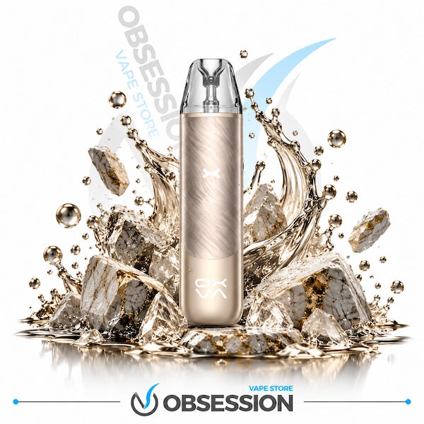 A metallic gold disposable vape device stands upright in the center, surrounded by dramatic ice cubes and water splashes on a white background. The Obsession VAPE Store logo is visible in the background and at the bottom.