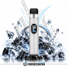 A silver and black Obsession vape device stands upright in front of a stylized splash of ice and water, with the Obsession brand logo and 'Obsession Vape Store' text visible on a white background.