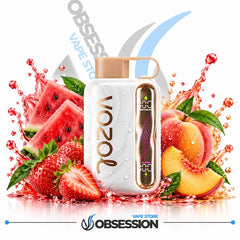 A white VOZOL vape device with a gold side panel and peach-colored mouthpiece, surrounded by fresh watermelon slices, strawberries, peaches, and water splashes on a white background. The Obsession / Obsess vape store branding is visible.