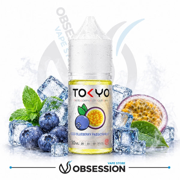 Tokyo vape juice bottle with blueberries, ice cubes, and passion fruit on a white background.