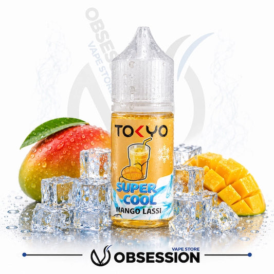 Bottle of Tokyo Super Cool Mango Lassi vape juice with mangoes and ice cubes on a white background.