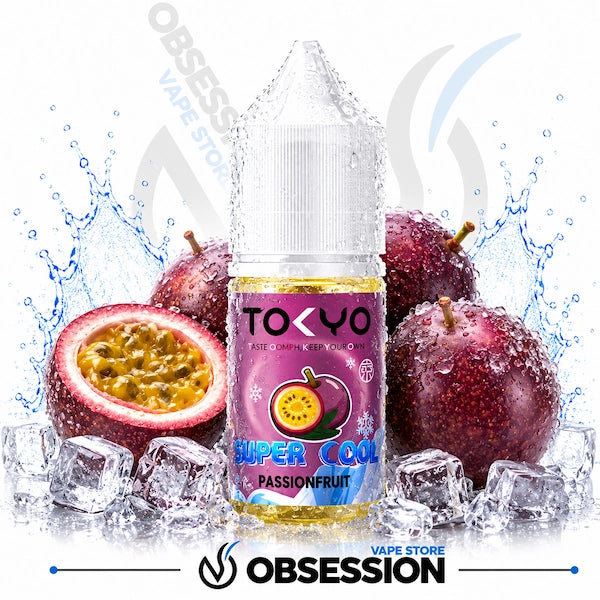 Bottle of Tokyo Super Cool Passionfruit vape juice with passionfruit and ice cubes on a white background.