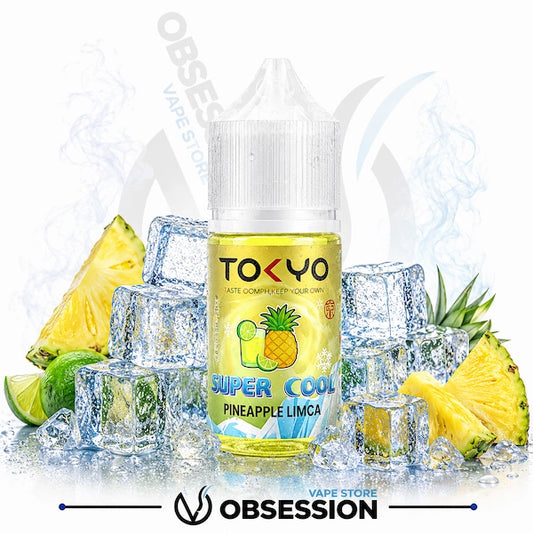 Bottle of Tokyo Super Cool Pineapple Limca vape juice surrounded by pineapples, limes, and ice cubes on a white background.