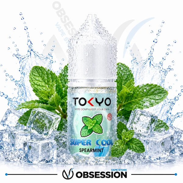 TOKYO Super Cool Spearmint vape juice bottle with mint leaves and ice cubes on a white background