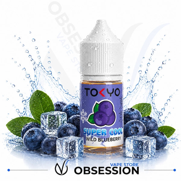 Bottle of Tokyo Super Cool Wild Blueberry vape juice with blueberries and ice cubes on a white background.