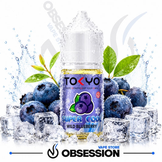 Tokyo Super Cool Wild Blueberry vape juice bottle surrounded by blueberries and ice cubes with 'Obsession' branding.