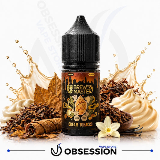 Uwell Brewmaster 3wais Mango Series – Cream Tobacco 30ml.webp shows a Uwell Brewmaster Cream Tobacco vape juice bottle surrounded by dried tobacco leaves, loose shredded tobacco, a rolled cigar or tobacco leaf, swirls of rich cream, a vanilla flower with vanilla beans, and warm, creamy liquid splash elements on a white background.