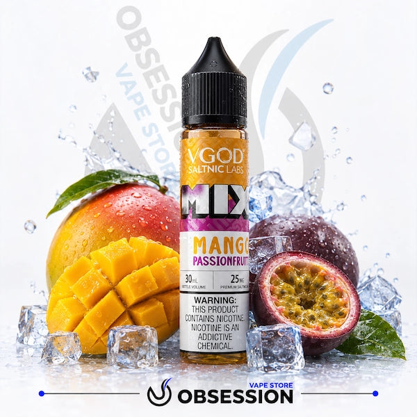 A bottle of VGOD Saltinic Labs Mango Passionfruit e-liquid centered between a whole mango, sliced mango, and a halved passionfruit, with ice cubes and water splashes on a white background. The bottle label shows VGOD Saltinic Labs and M1X branding.