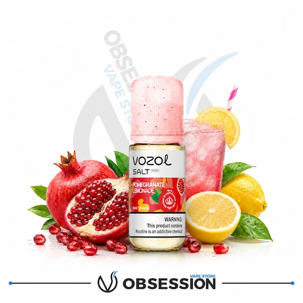Vozol salt e-liquid bottle with pomegranate lemonade flavor surrounded by pomegranate and lemon fruits on a white background.