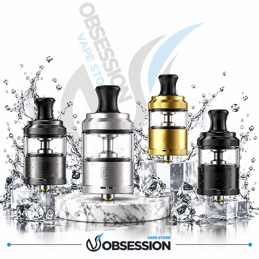Three Obsession vape tanks displayed on a marble pedestal with ice cubes and water splashes. The tanks are shown in three color options: black, silver, and gold.
