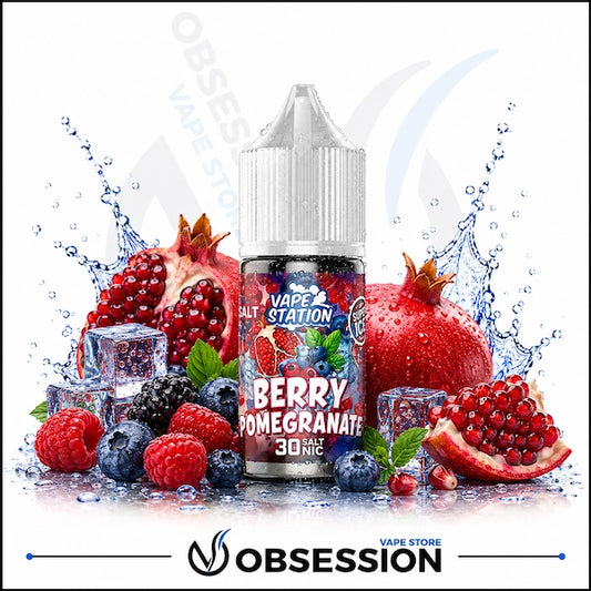 Vape Station Berry Pomegranate Ice Salt 30ml.webp shows a Vape Station Berry Pomegranate Super Ice SaltNic vape juice bottle with a clear, droplet-covered cap. The bottle is centered within a premium, high-contrast visual composition of rich orchard fruits and mixed berries