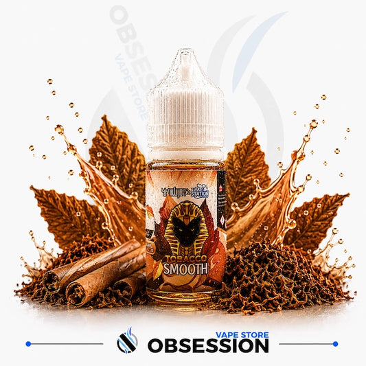 Vape juice bottle with tobacco flavor surrounded by leaves and cinnamon sticks, branded as Obsession Vape Store.