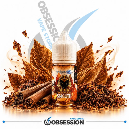 A bottle of Obsession Vape Store 'Smoke Smooth' e-liquid centered on a white background, surrounded by decorative props including brown tobacco leaves, cinnamon sticks, and loose tobacco. The bottle label features a black bird graphic and the words 'SMOOTH'.