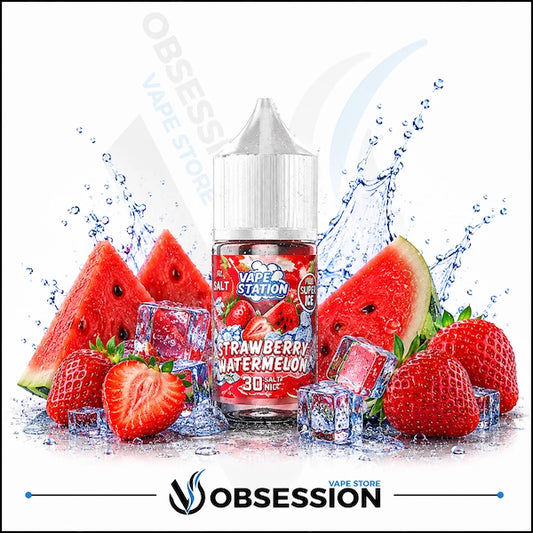 Vape Station Strawberry Watermelon Super Ice Salt 30ml.webp shows a Vape Station Strawberry Watermelon Super Ice SaltNic vape juice bottle with a clear, droplet-covered cap. The bottle sits centrally in a high-contrast arrangement of fresh flavor and cooling elements