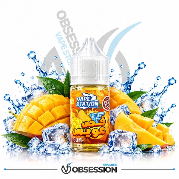 A 30ml bottle of Vape Station Super Ice Fous Eweis mango salt nicotine e-liquid (50mg) with a transparent droplet-covered dropper cap, centered among cross-cut diced mango halves, fresh juicy mango slices, green mango leaves, and crystal-clear ice cubes with dynamic blue water splashes over a reflective surface on a white background, featuring a subtle background watermark and the "OBSESSION VAPE STORE" logo along the bottom border.   