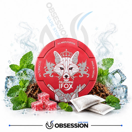 Red packaging with fox design surrounded by mint leaves, ice cubes, and tobacco leaves on a white background.