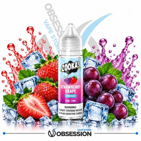 A bottle of Zook! Strawberry Grape e-liquid centered against a white background, surrounded by fresh strawberries, grapes, ice cubes, and colorful liquid splashes. The label reads 'ZOOK! Strawberry Grape Freeze' and includes a warning.